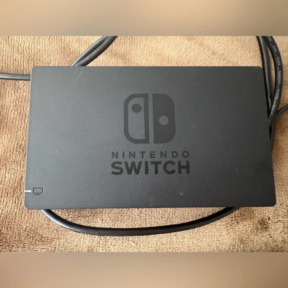 Nintendo Switch with Blue, Yellow and Gray Joy-Con